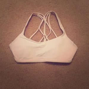White criss cross back sports bra